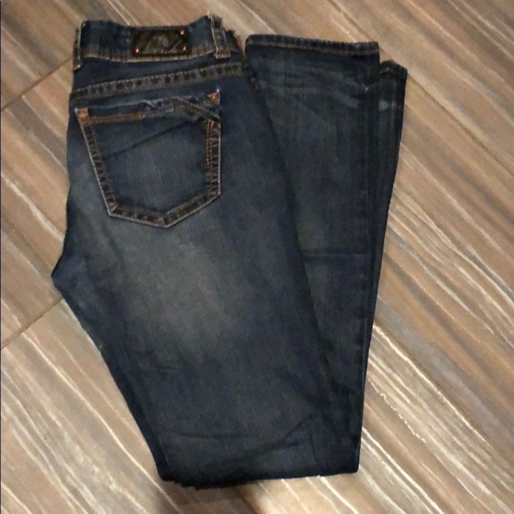 Buckle black skinny jeans